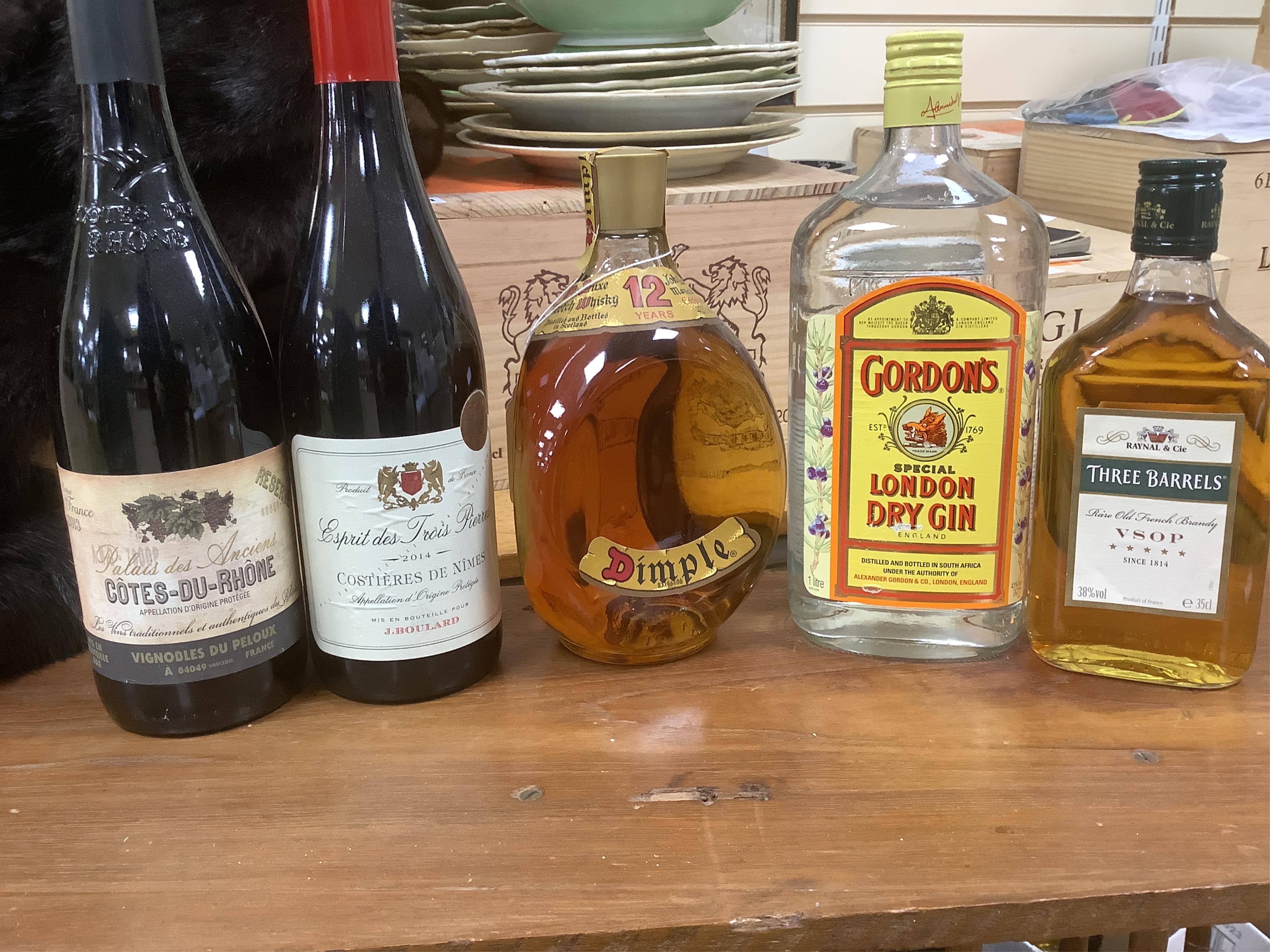 Fourteen bottles of wine and spirits, etc. including Dimple, Campari, Pliska Reserve V.S.O.P. 7 year brandy, Gordons Gin and others. Conditon - varies